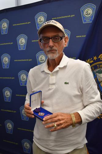 Manchester police award Purple Heart to late captain shot by sniper